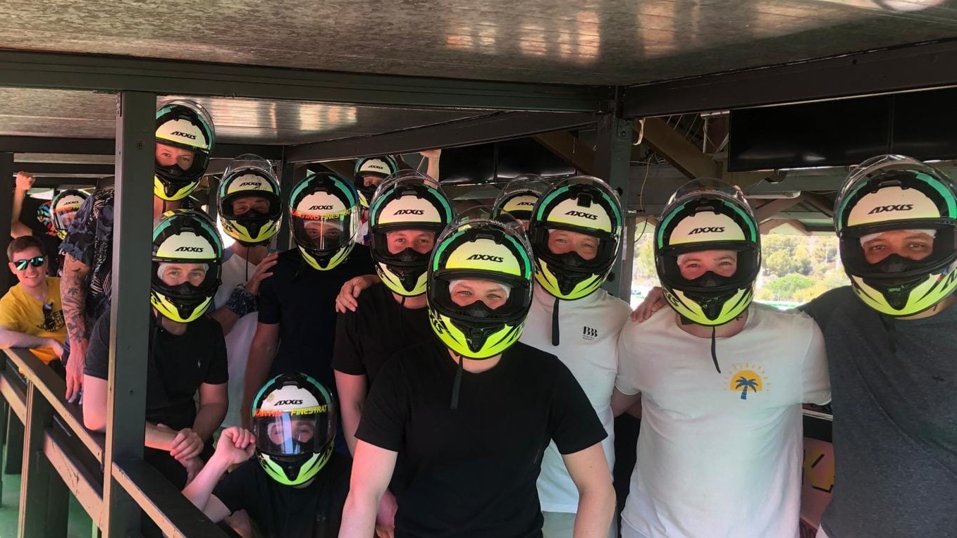 lads in go karting helmets